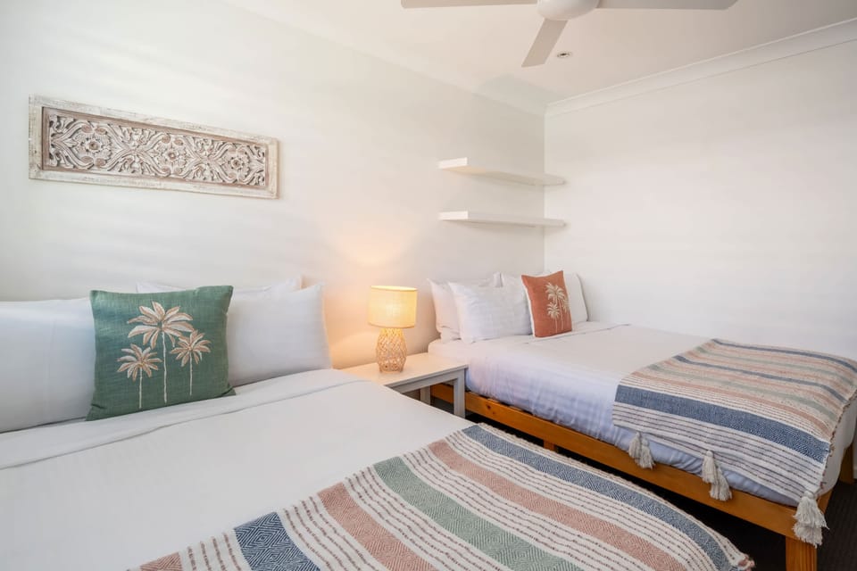Bedroom 3 features 2 Double beds and ducted A/C to keep you cool on a hot night