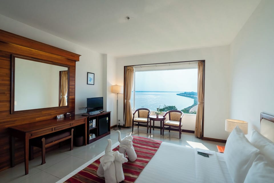 Superior Single Room, River View | 1 bedroom, minibar, in-room safe, desk