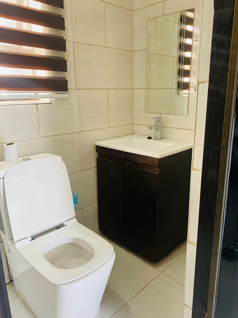 Deluxe Studio, Pool View | Bathroom | Towels, soap, toilet paper