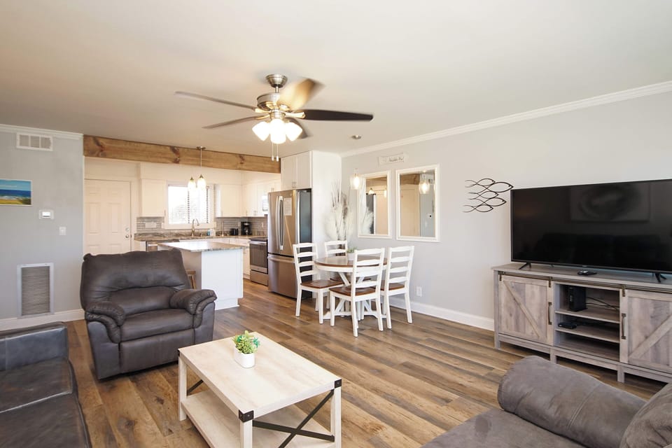 Relax in your open-concept haven with modern comforts, stylish furnishings, and thoughtful touches that make you feel right at home.