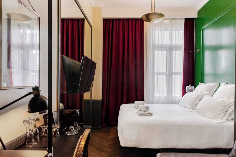 Premium bedding, down comforters, pillowtop beds, in-room safe