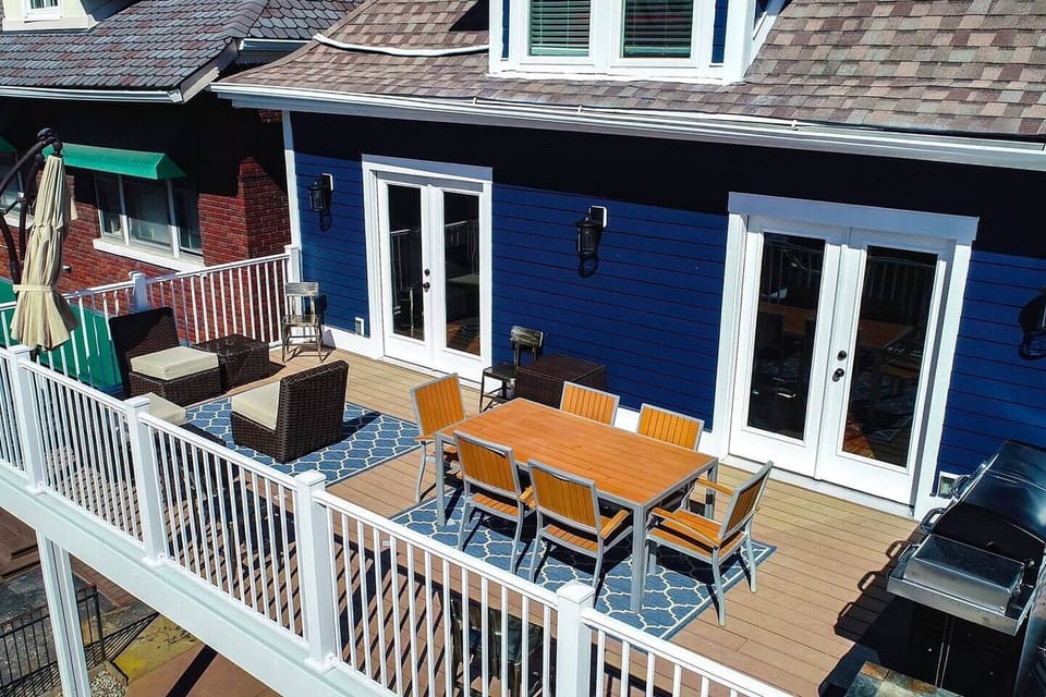 Our second story sky deck right off the kitchen and gathering room. Hang out and people watch from above. Or chill and BBQ.