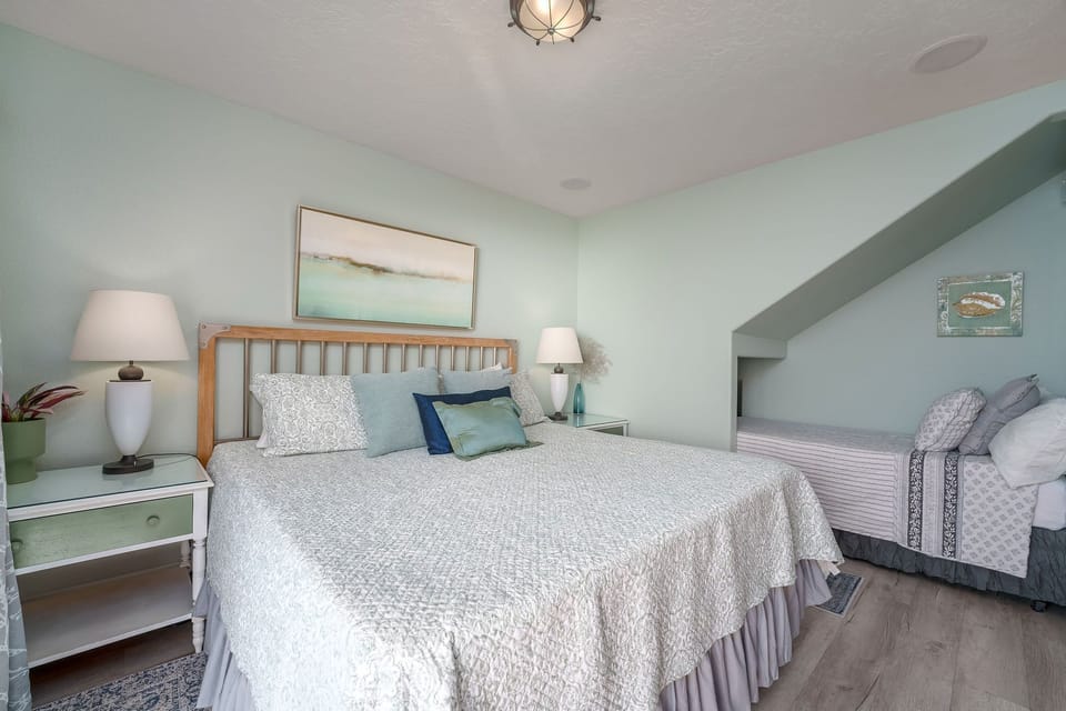 Make yourself at home in our warm and welcoming king with twin bedroom oasis.