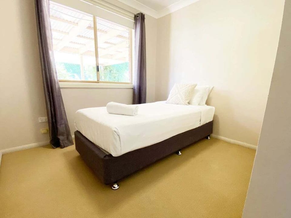 Bedroom 4 King bed (Can be split into singles on request)