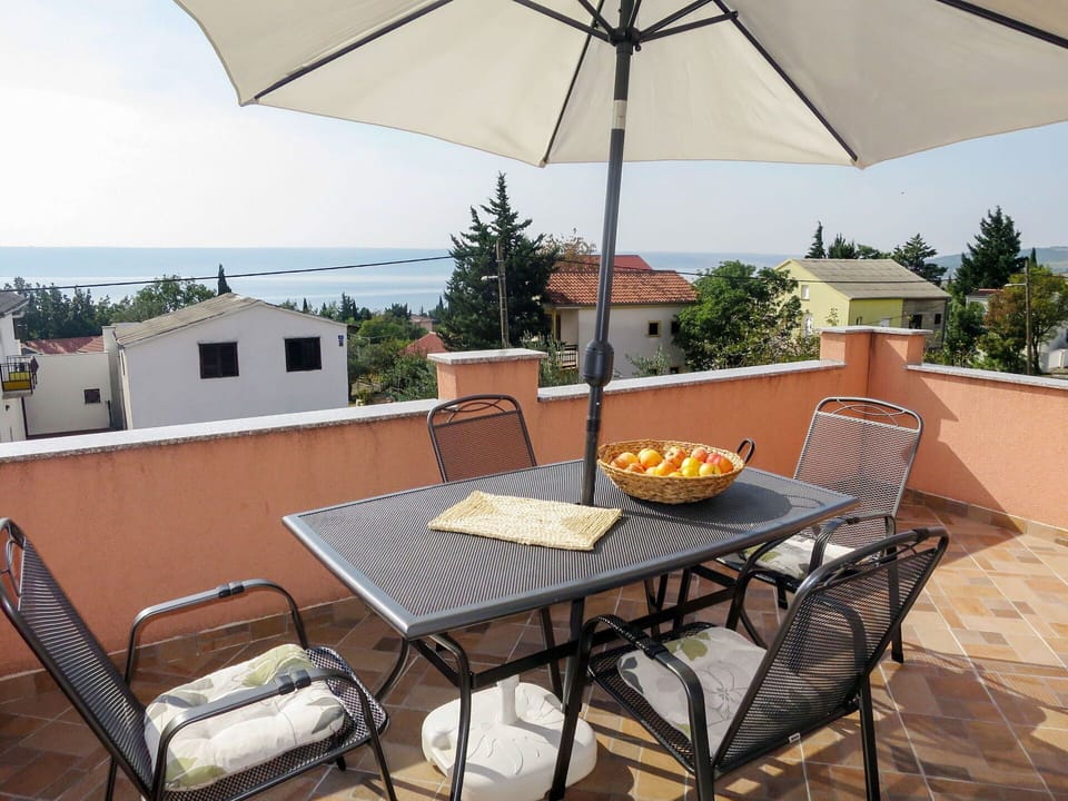Sky, Table, Furniture, Property, Building, Plant, Umbrella, Chair, Shade, Outdoor Furniture
