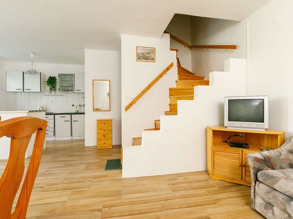 Furniture, Property, Cabinetry, Wood, Orange, Comfort, Building, Lighting, Interior Design, Flooring