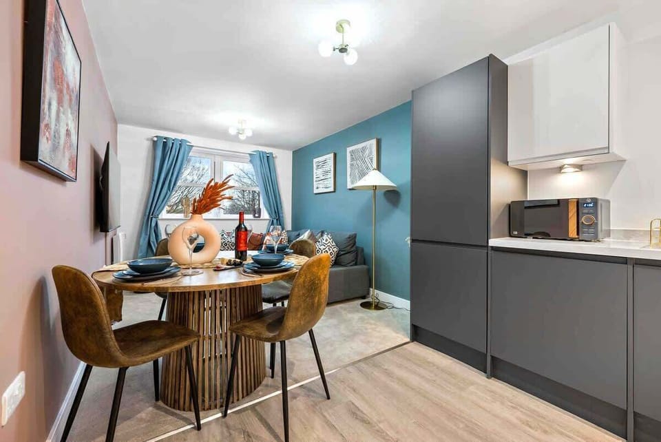 Living room combined dining area and kitchen at Blue Puffin Stays Short Lets & Serviced Accommodation