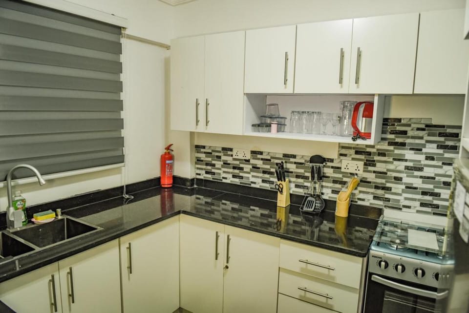 Apartment | Private kitchen | Fridge, microwave, oven, stovetop