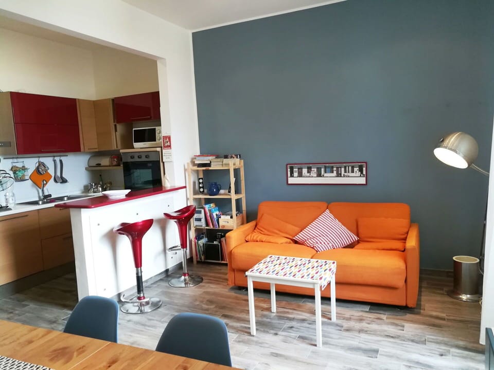 Furniture, Property, Table, Wood, Couch, Orange, Interior Design, Comfort, Flooring, Floor