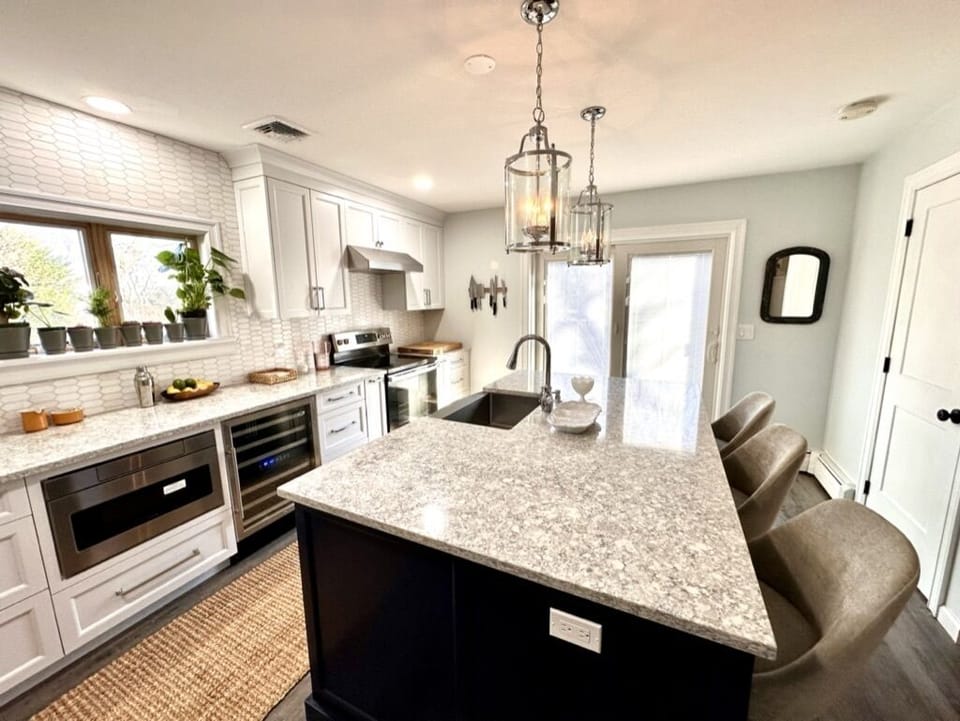 Upstairs kitchen with wine fridge