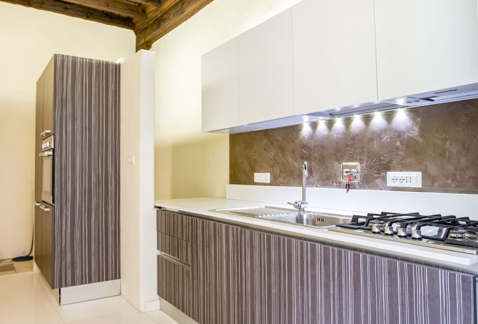 Superior Apartment, Courtyard Area | Private kitchen | Full-size fridge, microwave, oven, stovetop