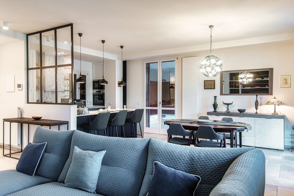 Apartment, Lake View | Living area | Flat-screen TV