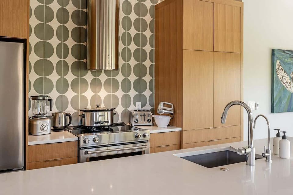 With our fully stocked kitchen featuring KitchenAid appliances, cooking and entertaining become a breeze, allowing you to indulge your culinary passions and create memorable meals for family and friends.