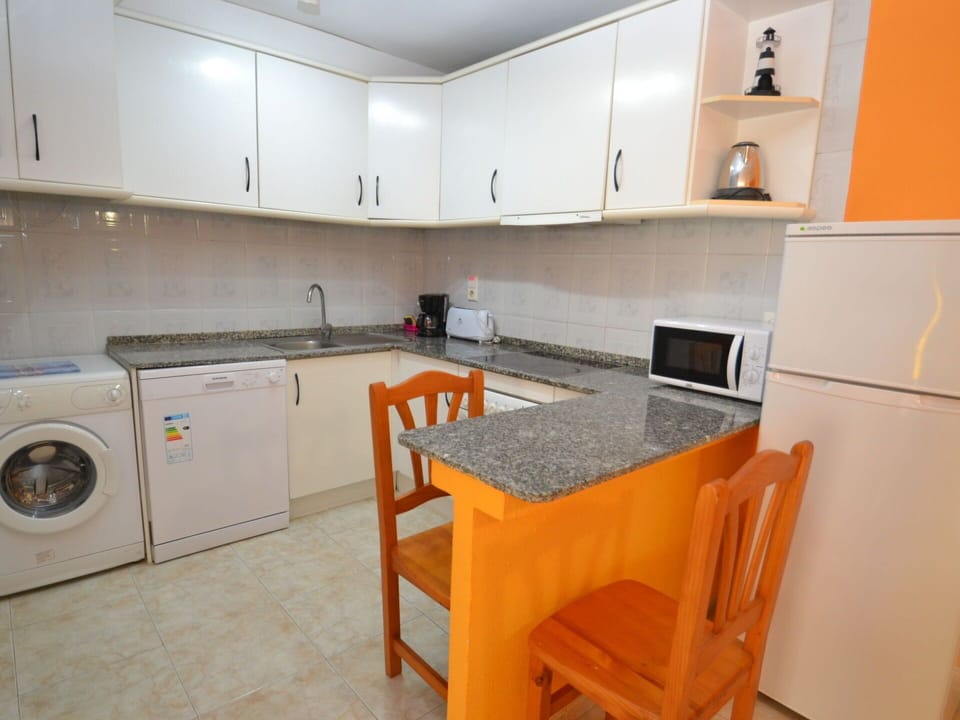 Cabinetry, Countertop, Furniture, Sink, Kitchen Appliance, Kitchen, Kitchen Stove, Kitchen Sink, Home Appliance, Wood