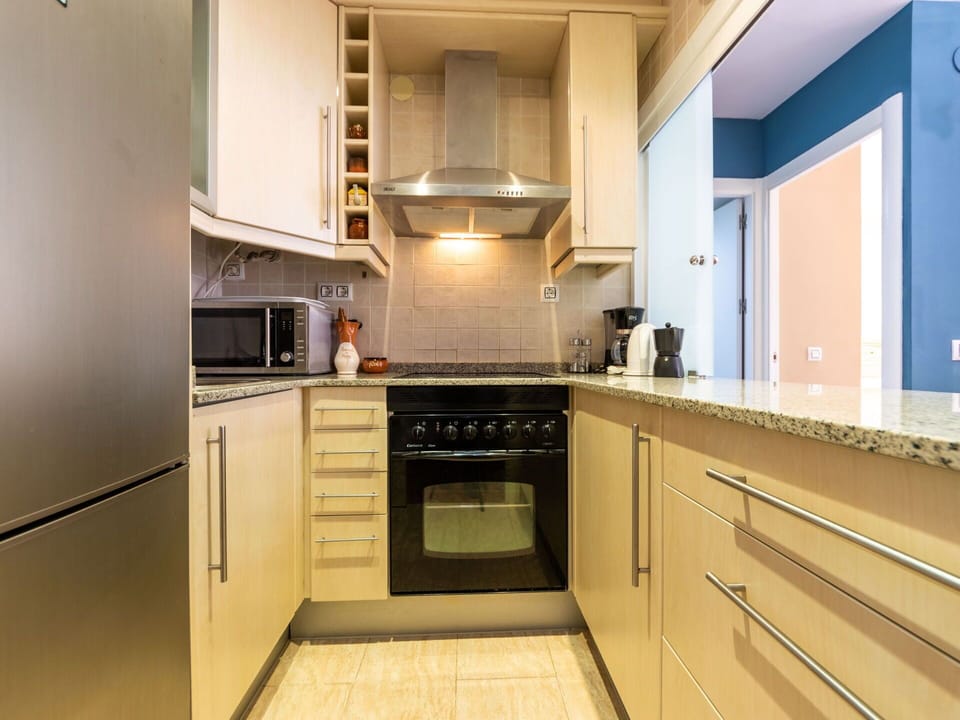 Countertop, Cabinetry, Furniture, Kitchen Stove, Kitchen, Wood, Kitchen Appliance, Building, Interior Design, Architecture