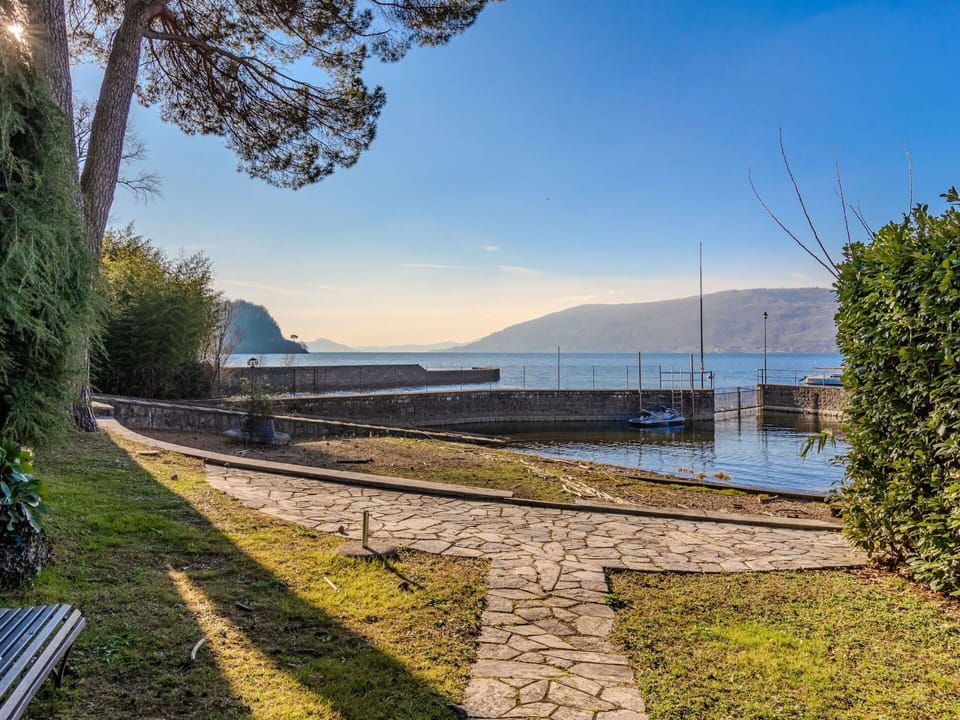 Water, Sky, Property, Swimming Pool, Azure, Cloud, Seaside Resort, Outdoor Furniture, Plant, Tree