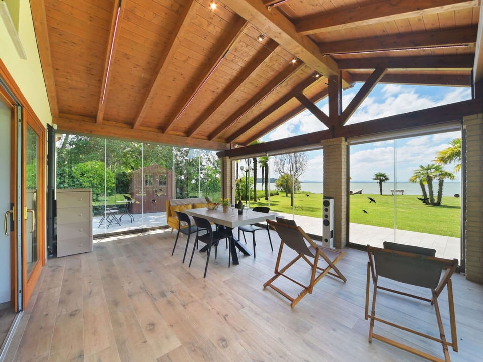 Plant, Furniture, Wood, Shade, Tree, Floor, Chair, Beam, Table, Flooring