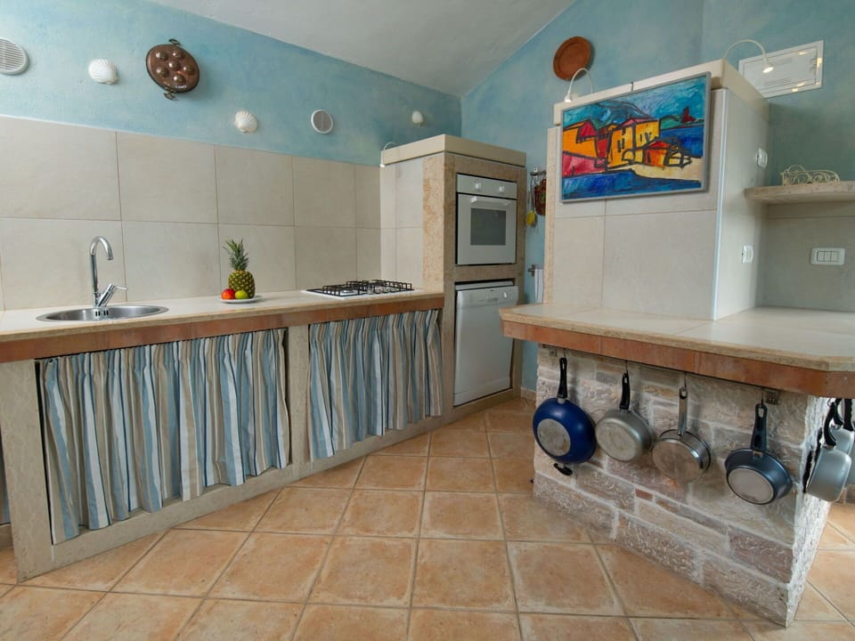 Furniture, Property, Plant, Comfort, Textile, Wood, Interior Design, Cabinetry, Houseplant, Flooring