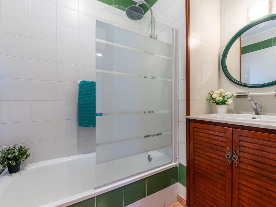 Mirror, Building, Property, Plant, Bathroom Cabinet, Tap, Cabinetry, Plumbing Fixture, Sink, Green