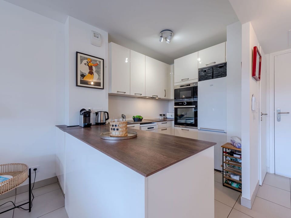 Furniture, Cabinetry, Property, Countertop, Table, Shelving, Lighting, Wood, Interior Design, Chair