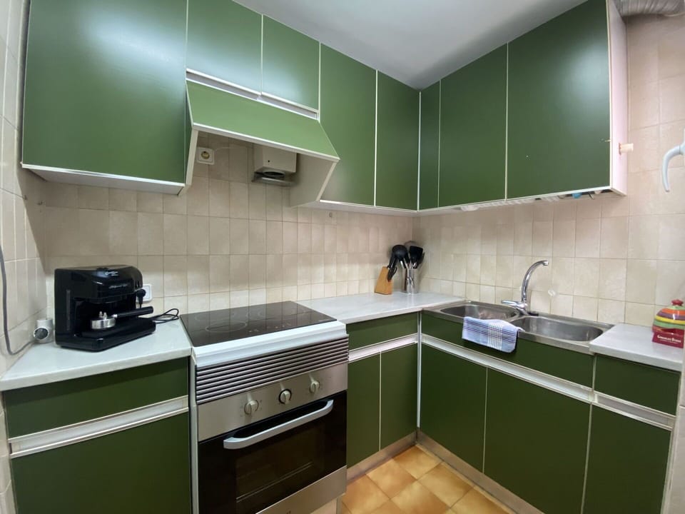 Cabinetry, Countertop, Tap, Property, Kitchen Sink, Plumbing Fixture, Kitchen Stove, Sink, Kitchen, Interior Design