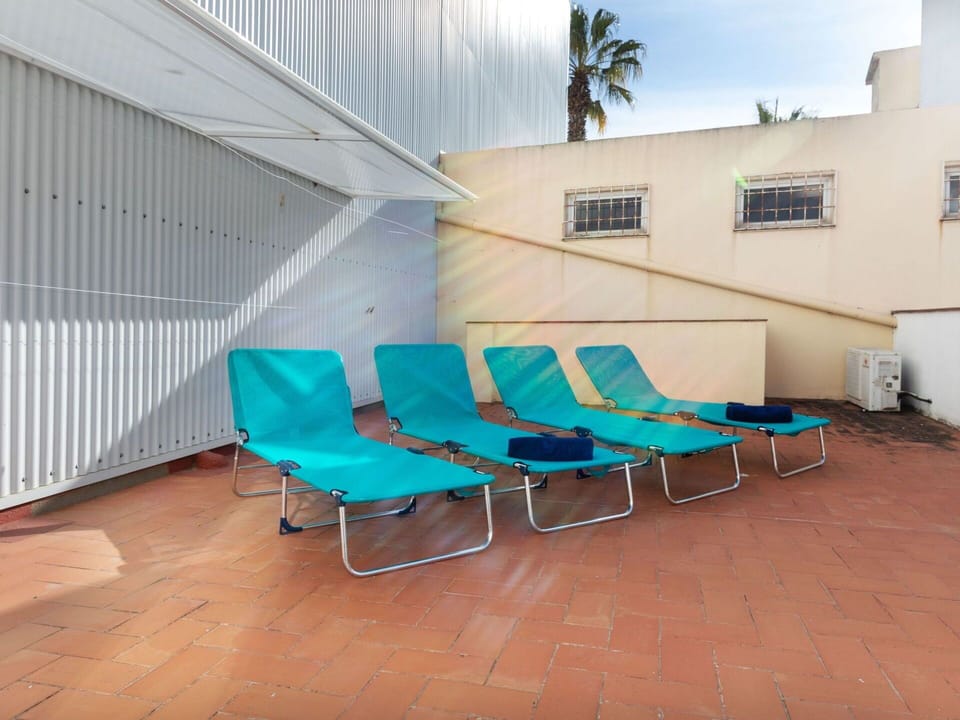 Furniture, Chair, Shade, Interior Design, Window, Sky, Building, Real Estate, Leisure, Flooring