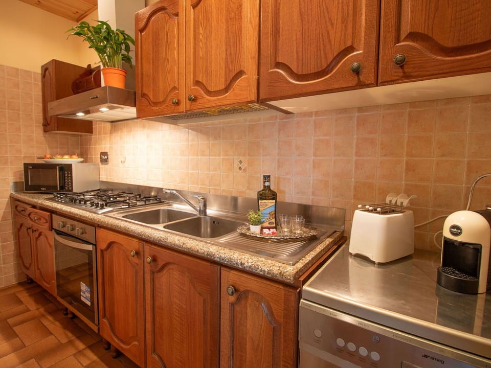 Brown, Cabinetry, Countertop, Property, Sink, Kitchen Sink, Kitchen Stove, Kitchen, Kitchen Appliance, Wood