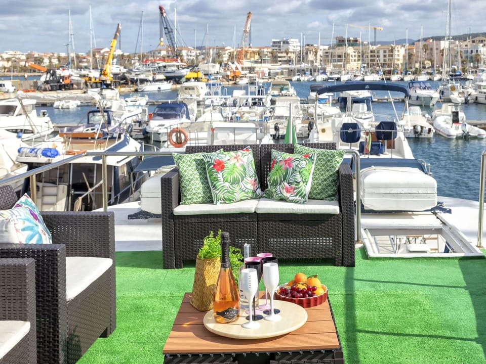 Sky, Cloud, Water, Boat, Watercraft, Outdoor Furniture, Vehicle, Table, Plant, Leisure