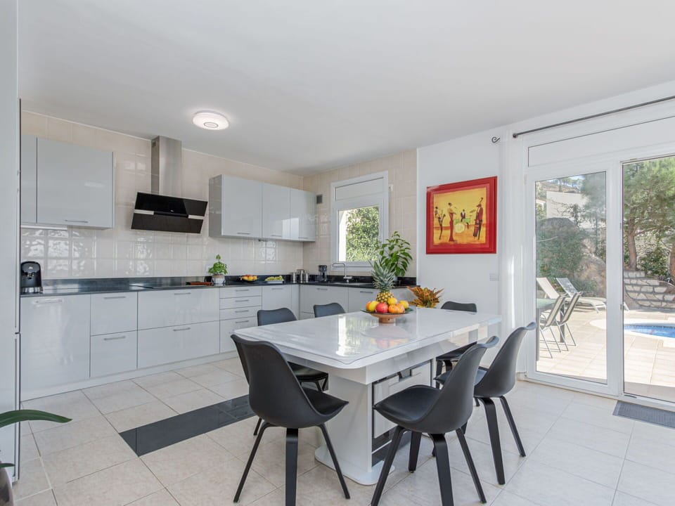 Table, Furniture, Cabinetry, Countertop, Chair, Wood, Building, Flooring, Interior Design, Floor