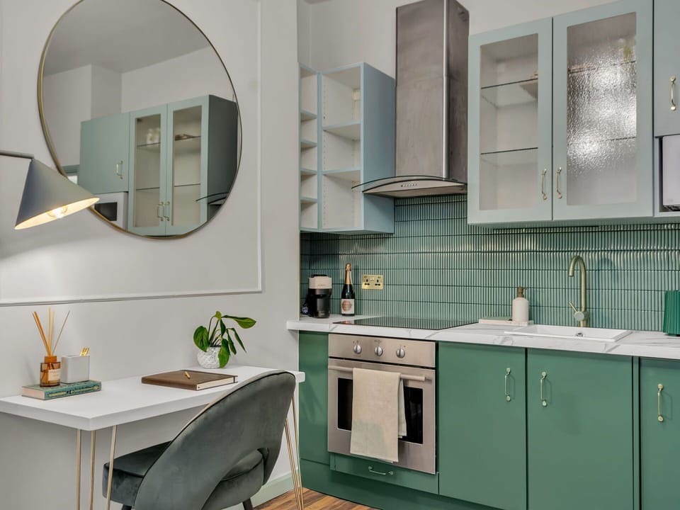 Interior Design, Furniture, Flooring, Kitchen, Cabinetry, Kitchen Appliance, Countertop, Light Fixture, Floor, Lighting