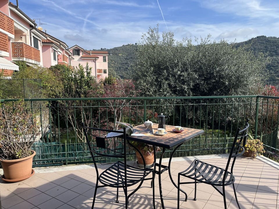 Cloud, Sky, Furniture, Table, Property, Building, Plant, Flowerpot, Chair, Outdoor Table