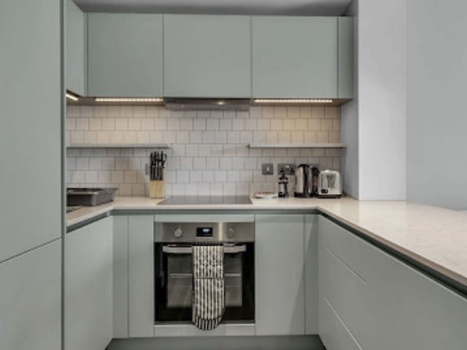 Cabinetry, Countertop, Property, Kitchen, Sink, Kitchen Stove, Interior Design, Flooring, Wood, Floor