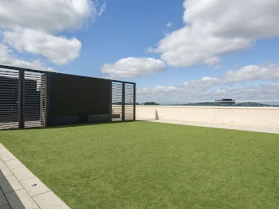 Cloud, Sky, Shade, Land Lot, Grass, Urban Design, Building, Landscape, Grassland, Facade