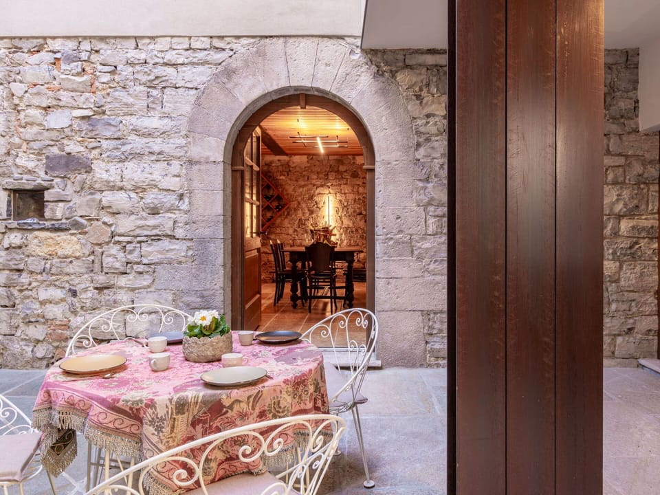Furniture, Table, Building, Chair, Tableware, Door, Interior Design, Tablecloth, Decoration, Outdoor Furniture