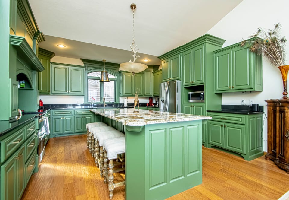 Bright and Open Kitchen with modern Stainless Steel Appliances.