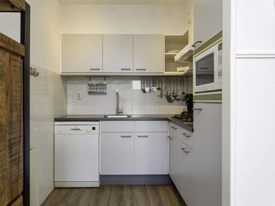 Cabinetry, Building, Tap, Property, Countertop, Sink, Kitchen Sink, Kitchen Stove, Kitchen, Wood