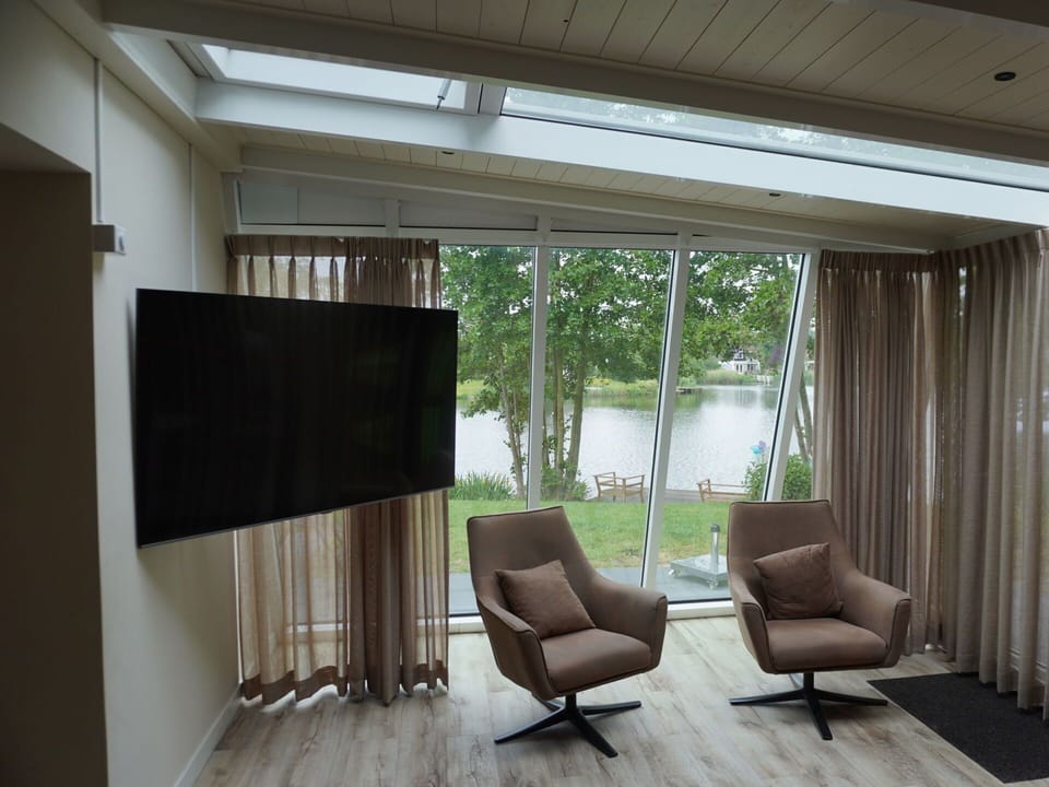 Property, Furniture, Wood, Building, Shade, Comfort, Architecture, Interior Design, Plant, Flooring