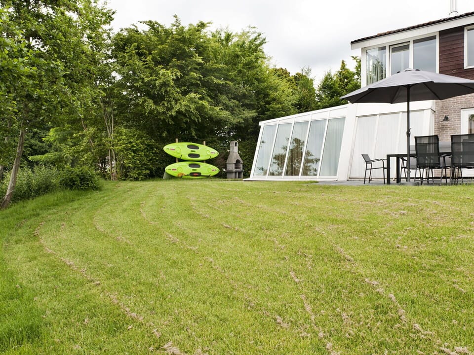 Plant, Building, Tree, Sky, Land Lot, Window, Grass, Shade, Natural Landscape, Groundcover