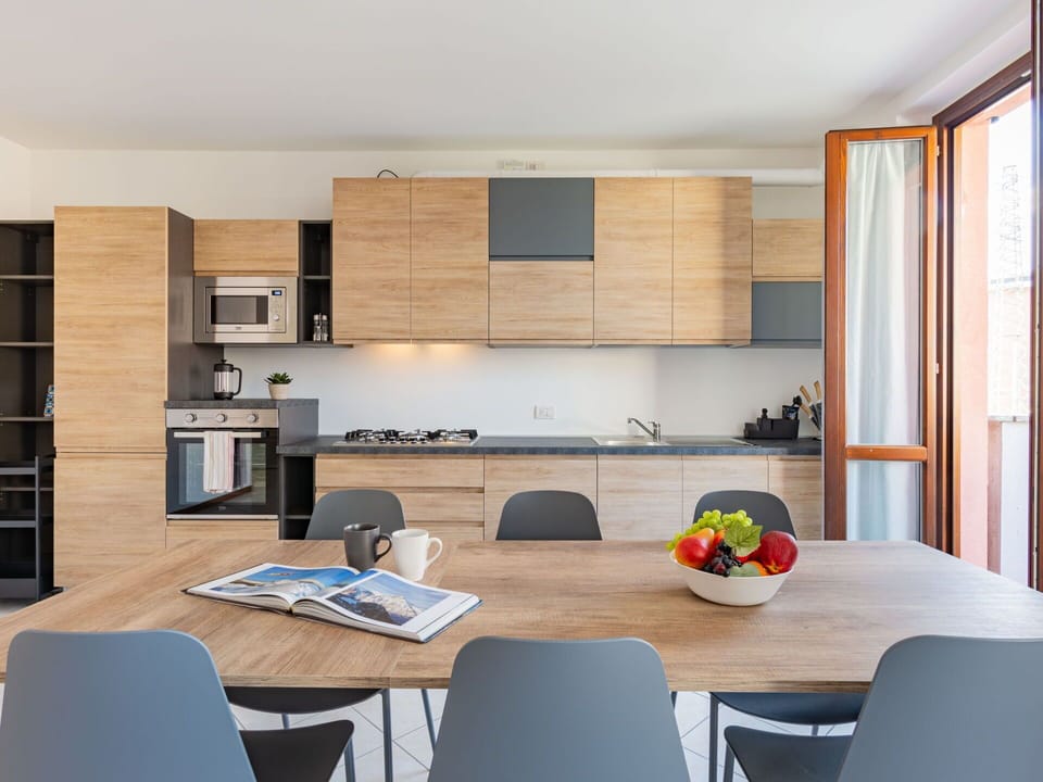 Table, Furniture, Cabinetry, Building, Chair, Wood, Architecture, Flooring, Countertop, Living Room