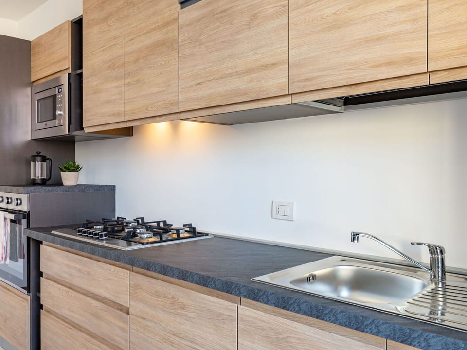 Kitchen Sink, Property, Countertop, Cabinetry, Sink, Wood, Kitchen, Gas Stove, Kitchen Stove, Kitchen Appliance