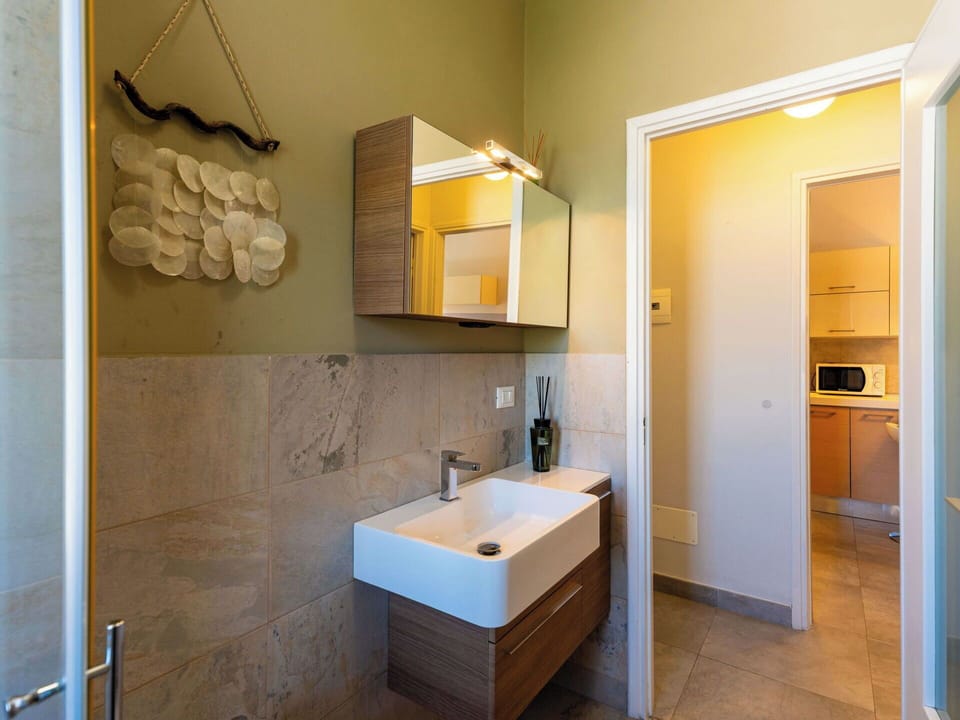 Bathroom Sink, Flooring, Bathroom, Plumbing Fixture, Interior Design, Wall, Floor, Sink, Tap, Bathroom Cabinet