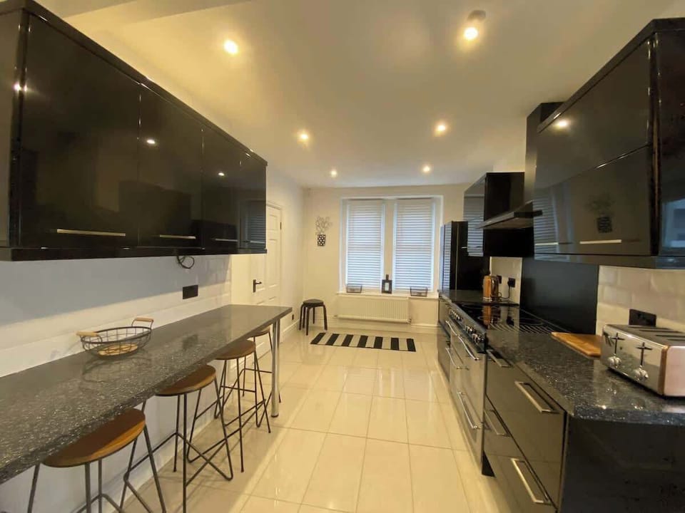 Kitchen, showing ample storage and breakfast bar