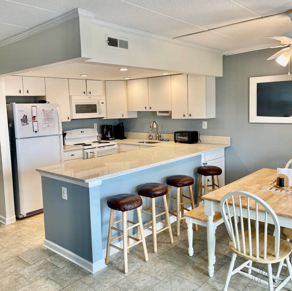 Stocked kitchen for in home dining or snacks