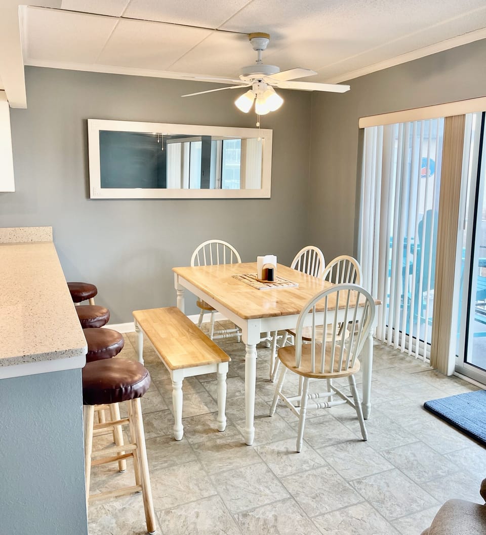 Seating for 6 at the table and 4 bar stools at the counter