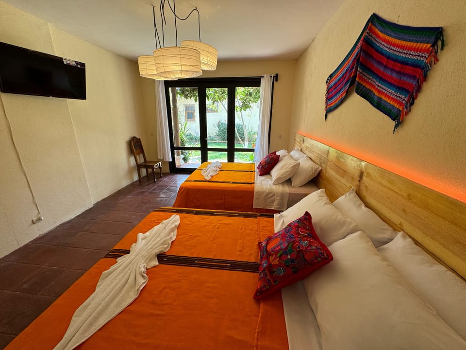 Deluxe Room, Garden View | Desk, laptop workspace, WiFi (free)
