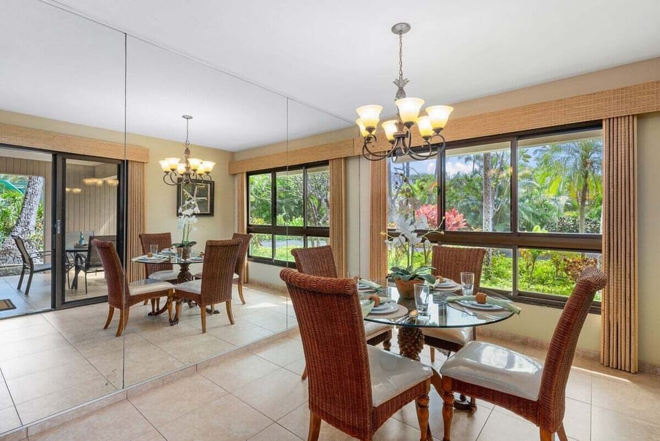 Enjoy a cozy dining area with elegant décor and vibrant scenery outside