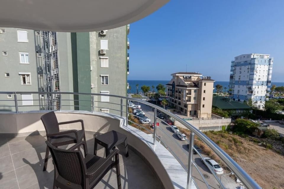 Deluxe Suite, 1 Bedroom, Partial Sea View | In-room safe, iron/ironing board, free WiFi