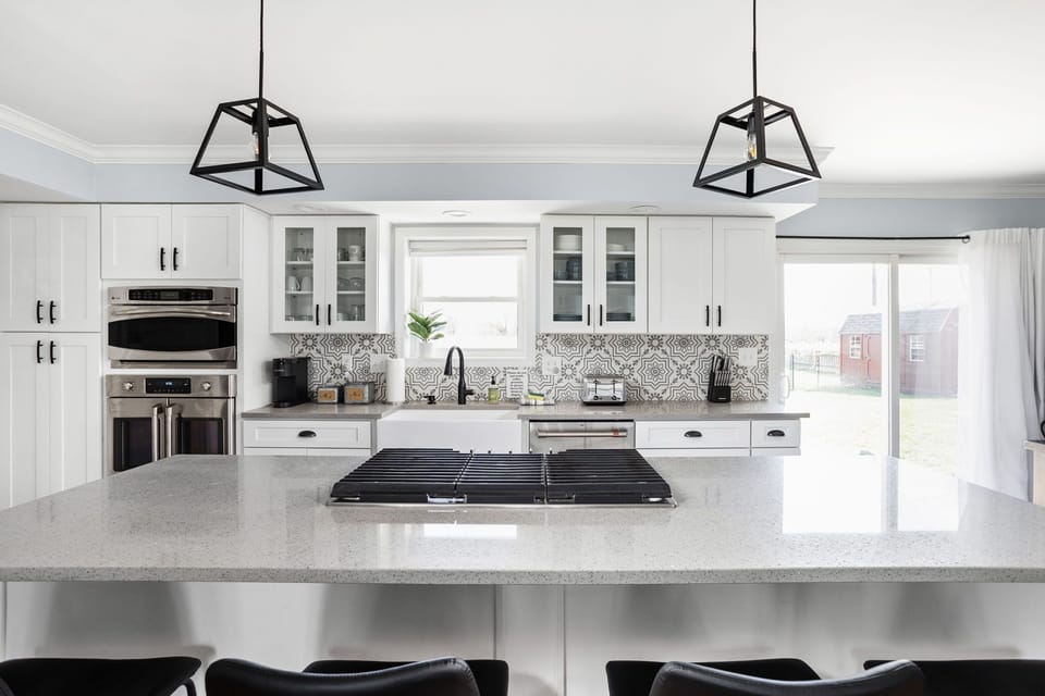 Executive style kitchen with high end appliances and all the needs for a home cooked meal. 