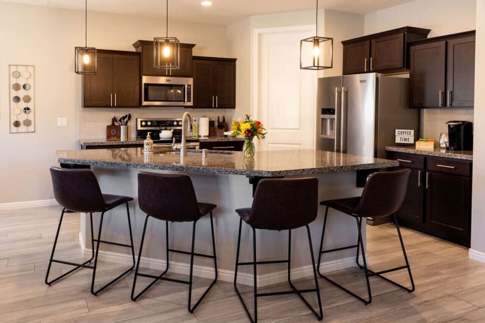 Island seating for 4 in our beautiful, well stocked kitchen.