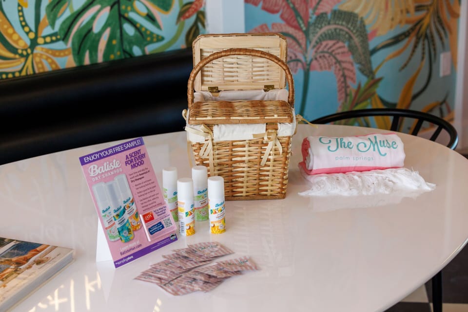 Welcome basket with toiletries and travel guides.
